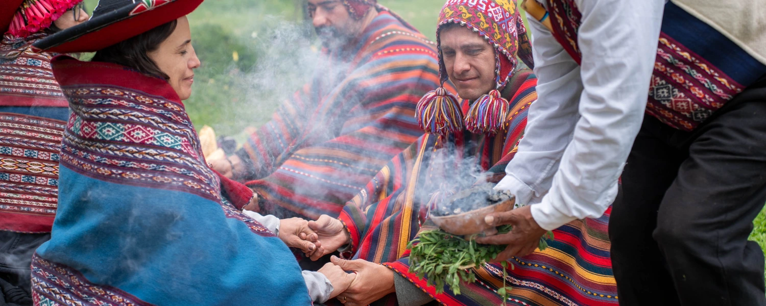 Couple participating in an Andean wedding ritual with Peru Grand Travel