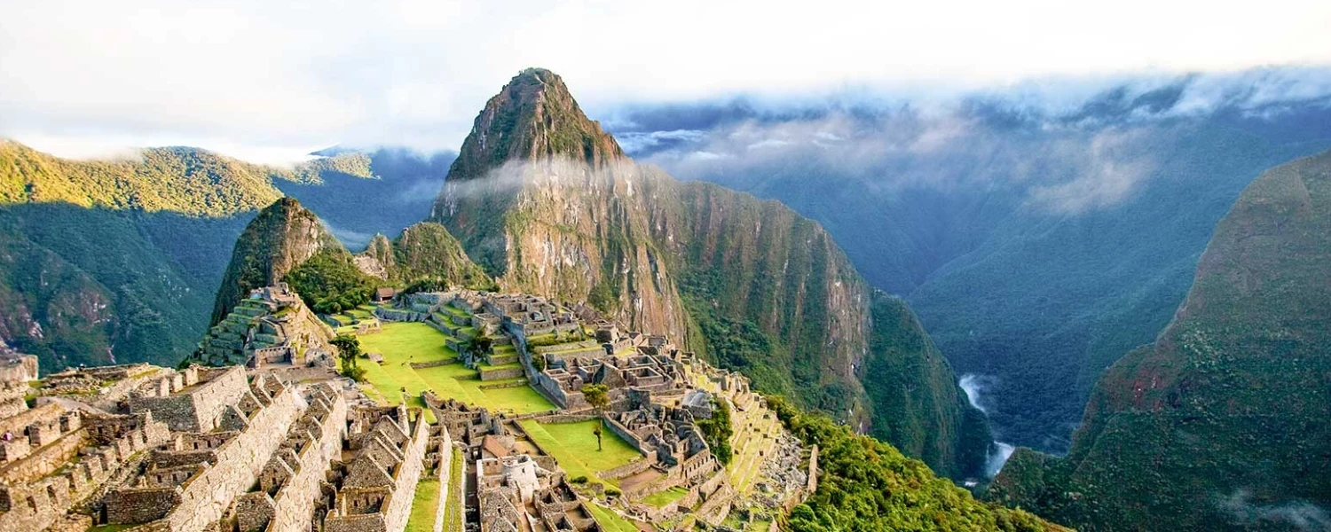 Magnificent panoramic view of Machu Picchu and its iconic ancient stone terraces.