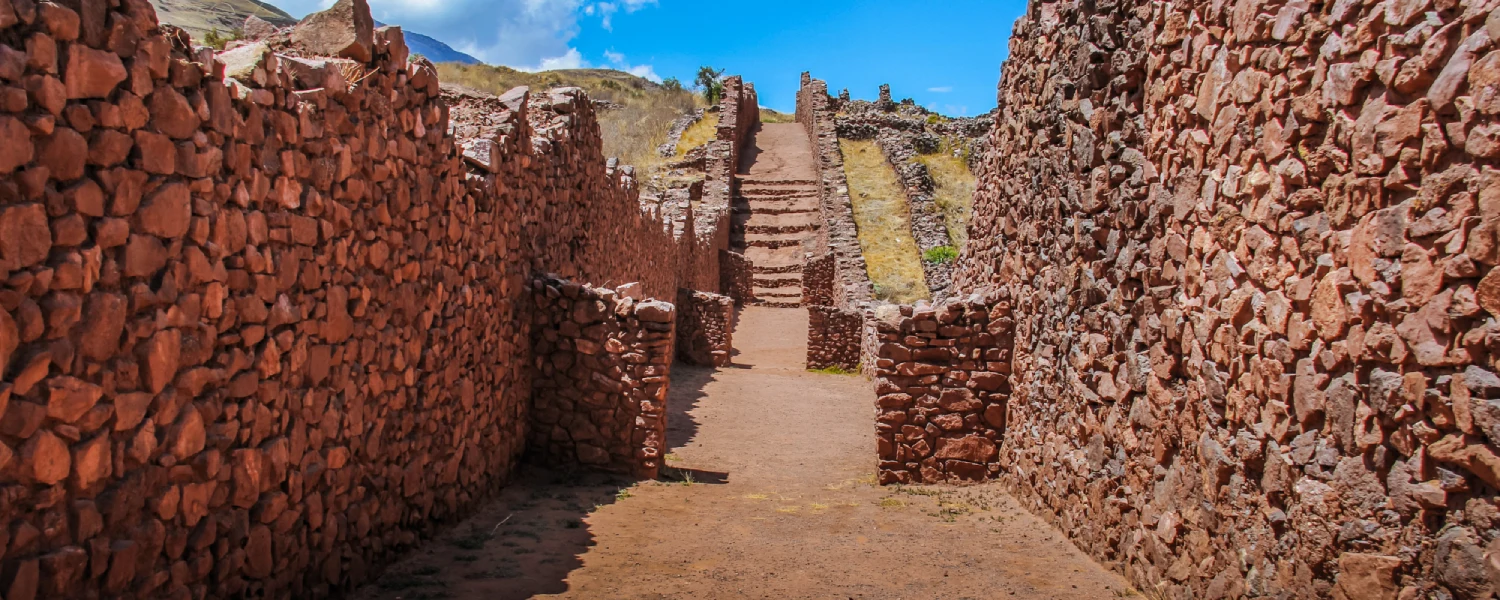 Pikillacta ruins featuring extensive stone walls and historic Wari architecture.