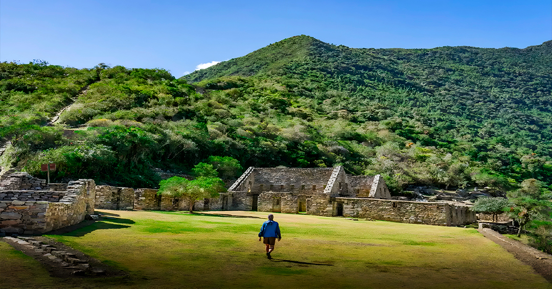 A group of trekkers taking in the sweeping Andean mountain scenery during the Choquequirao route