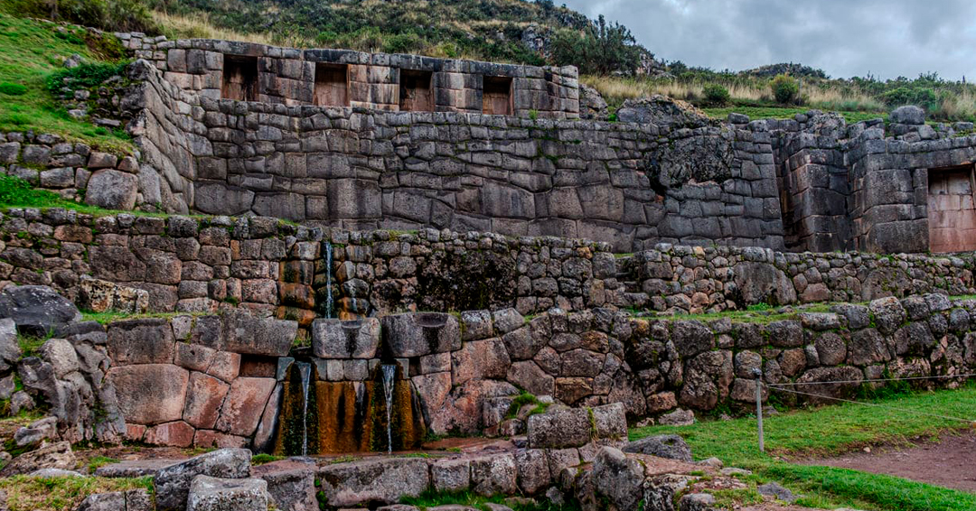 Stone water channels, aqueducts, and terraced fountains at the Tambomachay Inca site