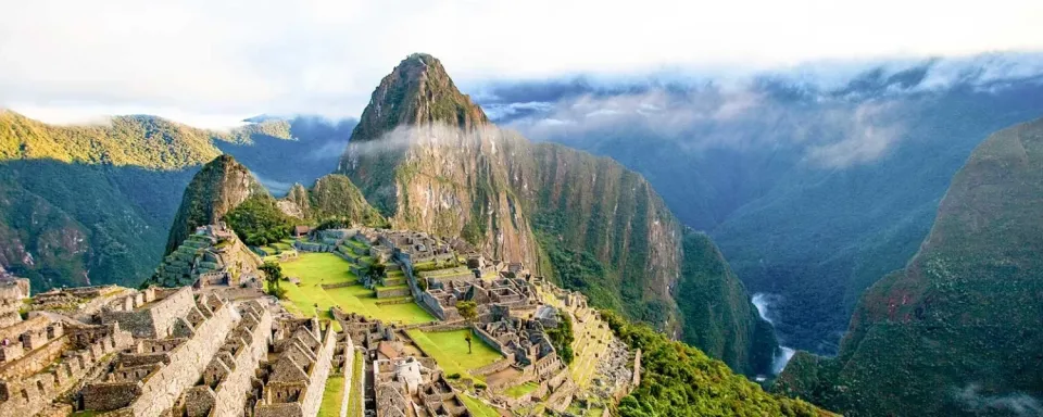 Magnificent panoramic view of Machu Picchu and its iconic ancient stone terraces.