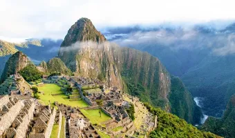Magnificent panoramic view of Machu Picchu and its iconic ancient stone terraces.