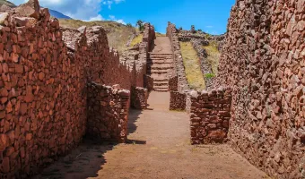 Pikillacta ruins featuring extensive stone walls and historic Wari architecture.