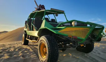 Dune buggy on the sand dunes of Huacachina, Peru