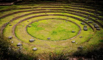 Close view of concentric stone terraces forming a circular agricultural structure at Moray in Cusco