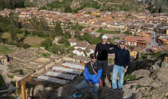 Travelers at the Ollantaytambo archaeological site in the Sacred Valley