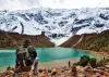 Traveler overlooking the turquoise Humantay Lake