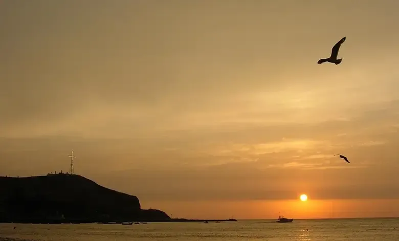 Sunset on the beach of Barranco Lima