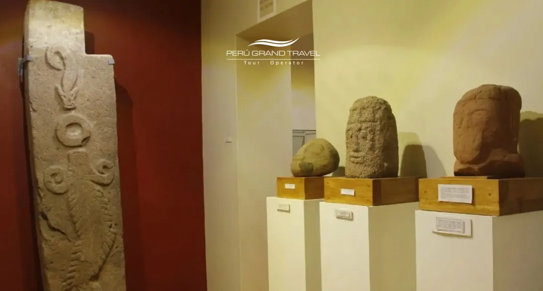 Stone sculptures and carved monoliths displayed inside the Carlos Dreyer Museum in Puno