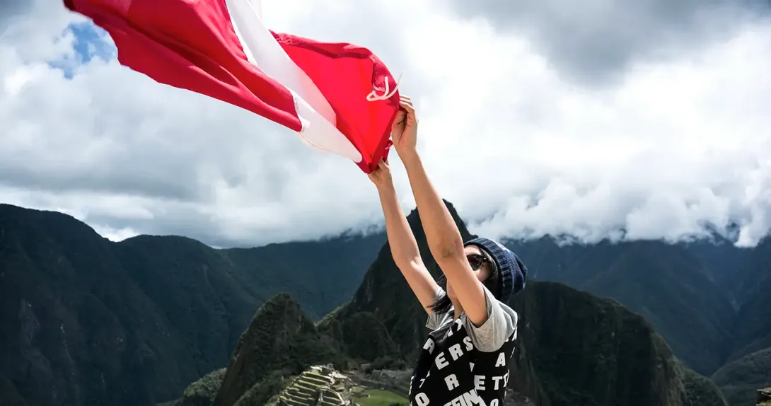 machu picchu with the flag of peru