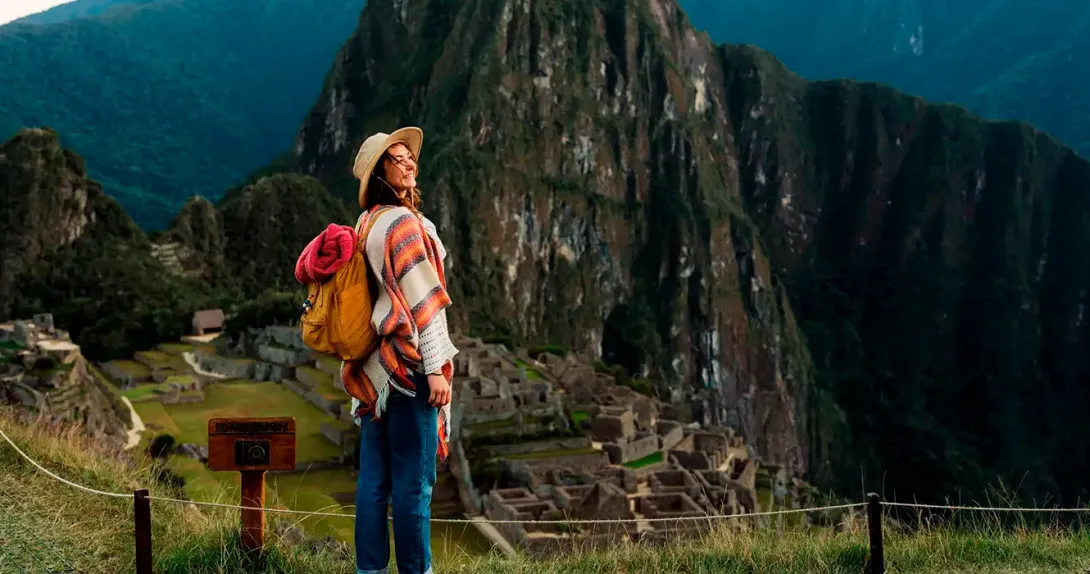 Tourist visit Machu Picchu, contemplating the landscape around Machu Picchu
